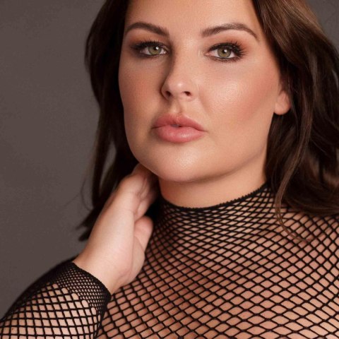 Long dress with fishnet structure and turtle neck. Long dress with fishnet structure and turtle neck.